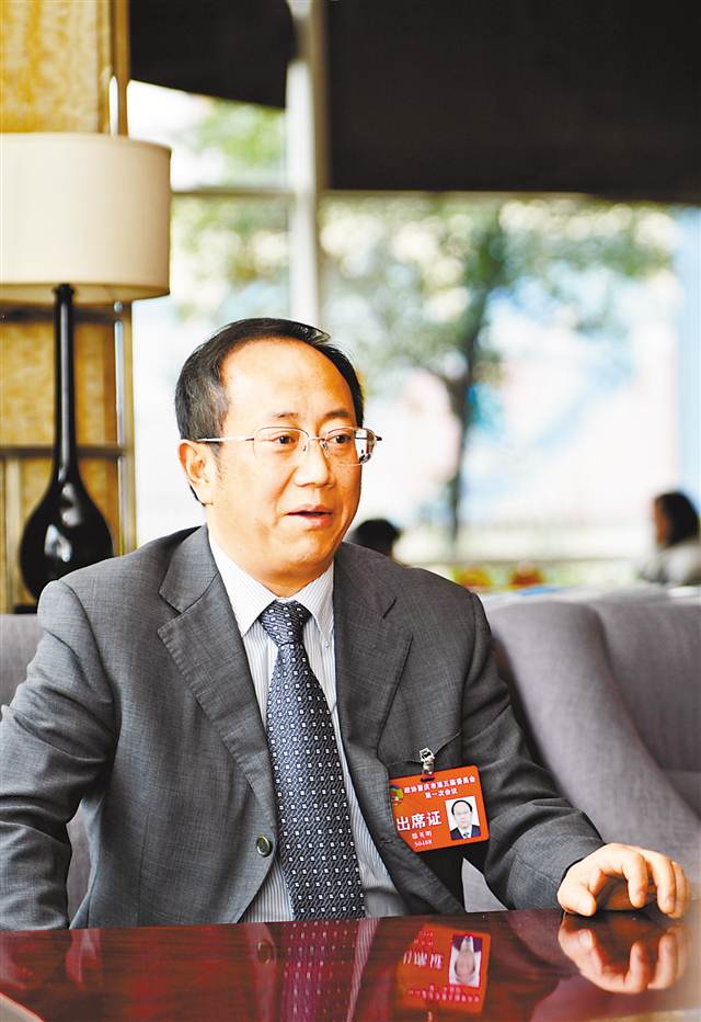 市政协委员,市交委副主任滕英明